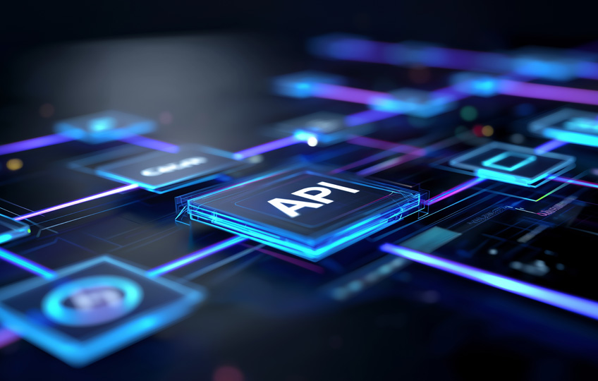 Das Wort „API“, welches auf dem Bild zu sehen ist, symbolisiert die nahtlose Data Integration zwischen Systemen.